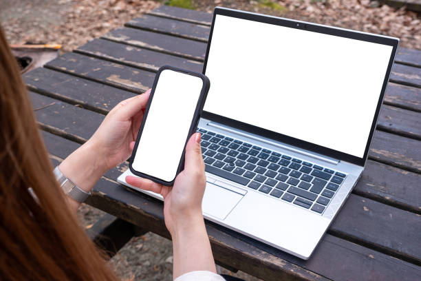 istock A Woman Embraces Remote Work: Balancing Nature with Technology 2152370623
