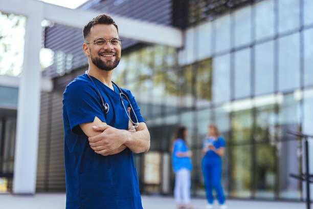 istock Young male nurse home caregiver 2152376465