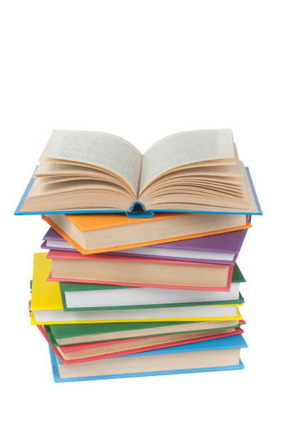 istock Book stacking. Open book, hardback books on white background. Back to school. Copy space for text. 2152379494