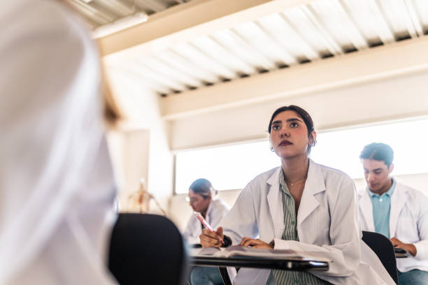 istock Young medical student woman studying during class at university 2152387998