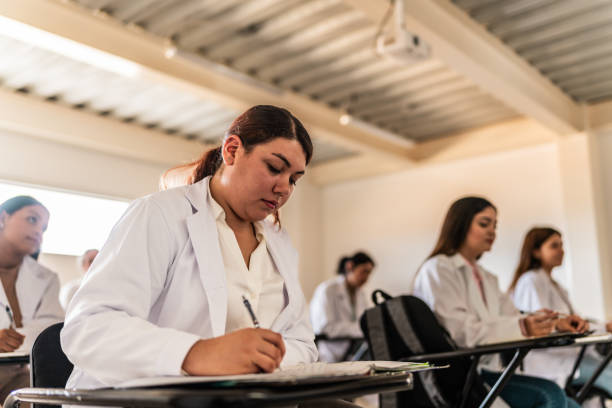 istock Young medical student woman stuyding during class at university 2152388003