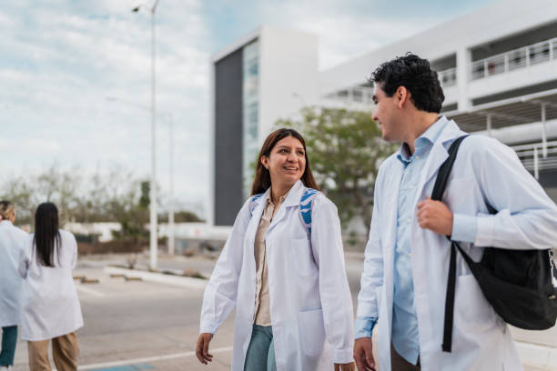 istock Young medical students talking and leaving the university 2152389027