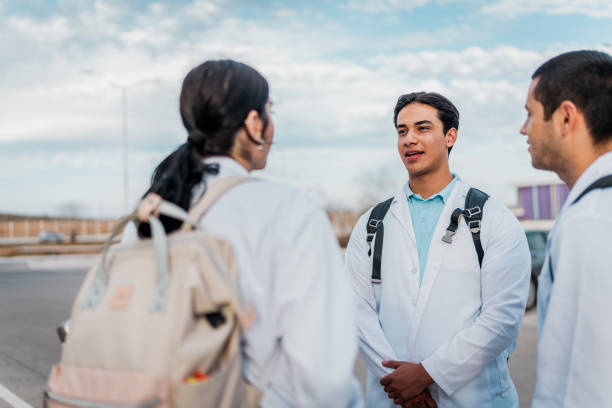 istock Young medical student friends talking outside the university 2152389032