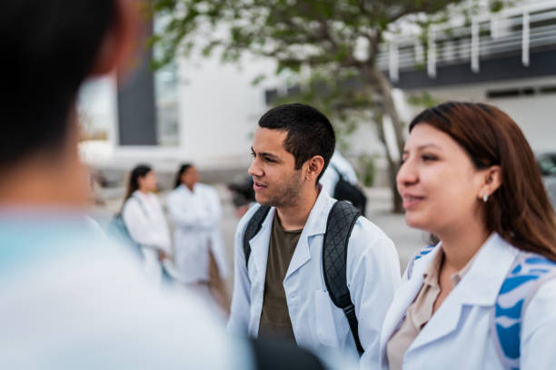 istock Young medical student friends talking outside the university 2152389038