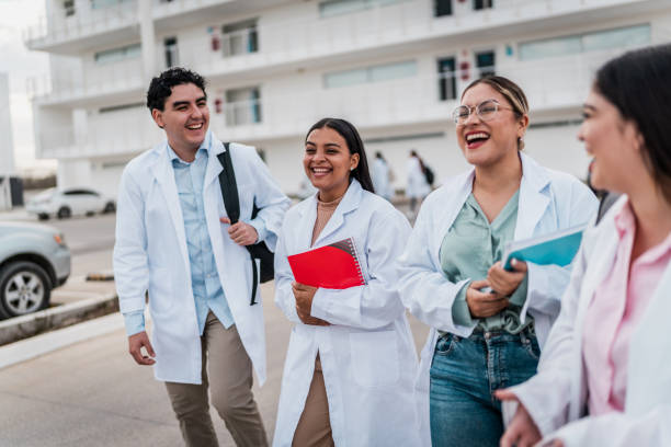 istock Young medical students talking and leaving the university 2152389067