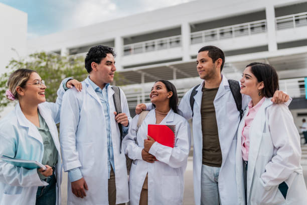 istock Young medical students friends talking outside the university 2152389075