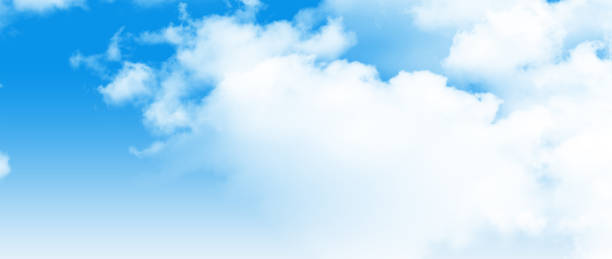 istock Blue Sky With Fluffy White Clouds on a Bright Sunny Day 2152389224