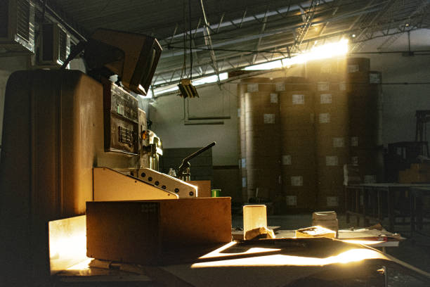 Wide view of automated CNC machining stations and control panels inside a modern manufacturing plant