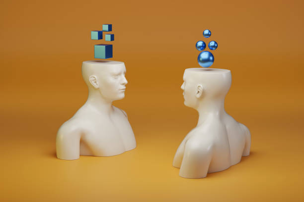 istock Two human figures facing each other with geometric bodies on their heads. Thinking concept. 3d illustration. 2152391827
