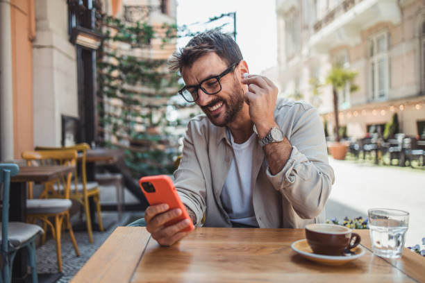 istock A modern young man in casual clothes is using a smartphone to chat with friends 2152391938