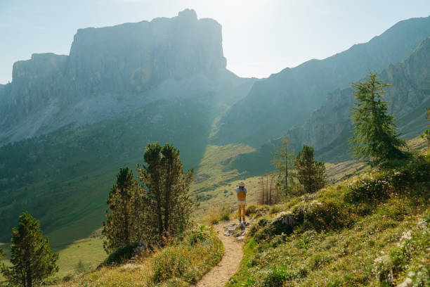 istock Determined woman hiking in Dolomites mountains in summer 2152393607