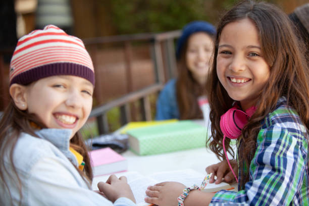 istock Group of girls doing homework, back to school 2152395958