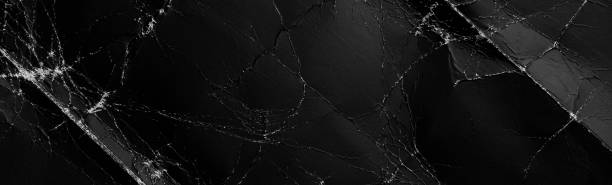 istock Abstract damaged black background from crumpled paper 2152400648