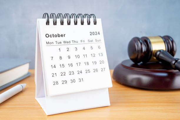 istock Desk calendar for October 2024 and judge's gavel 2152405961