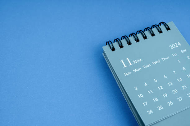 istock November 2024 desk calendar on blue color background. 2152405966