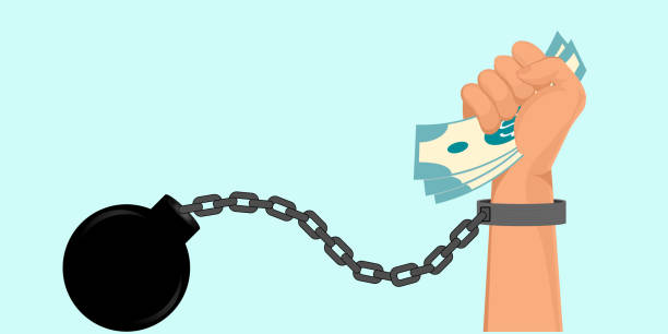 istock Hand holding cash money in hand bound by shackles chain. 2152407164