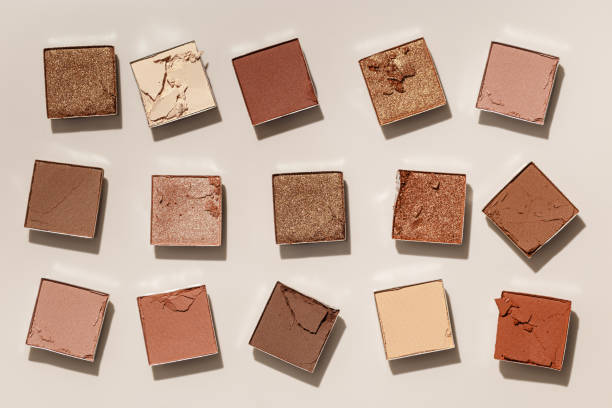istock Beauty product neutral color eyeshadows for makeup, beige monochrome pattern on light background, flat lay with nude colors swatches eyeshade, cosmetic texture, beige color palette, top view pattern 2152407375