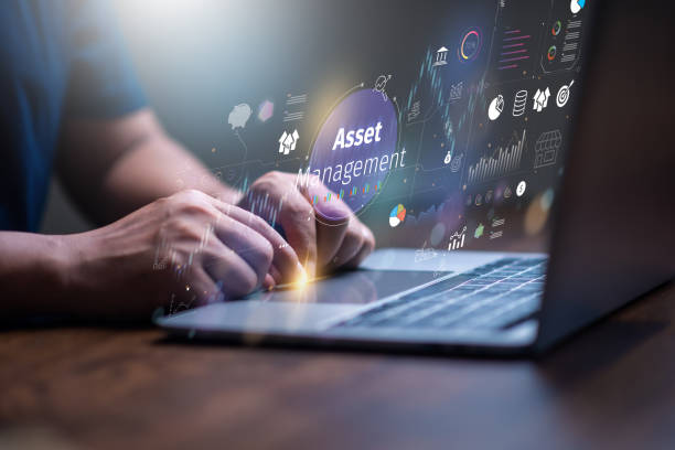 istock Asset management concept, Businessman using laptop and touch asset management Icon  on virtual display. Financial Property Digital assets. 2152409493