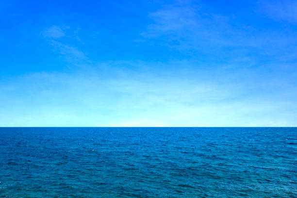 istock Background for summer vacation concept. Beach nature and summer seawater with sunlight light sandy beach Sparkling sea water contrast with the blue sky. 2152409636