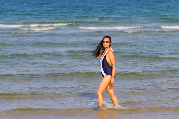 istock Woman body beautiful with bikini relax on beach 2152424491