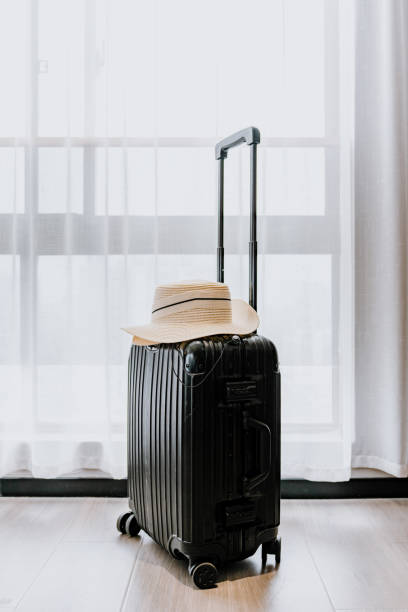istock Ready for Adventure: Elegant Luggage with Stylish Hat 2152426806