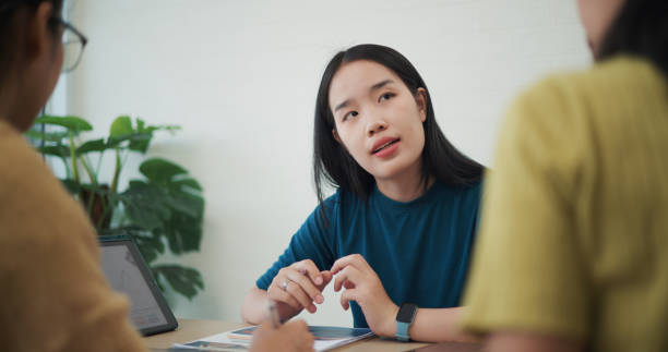 istock Females business team talking and discussing for data analysis on project plan in modern office. 2152429324