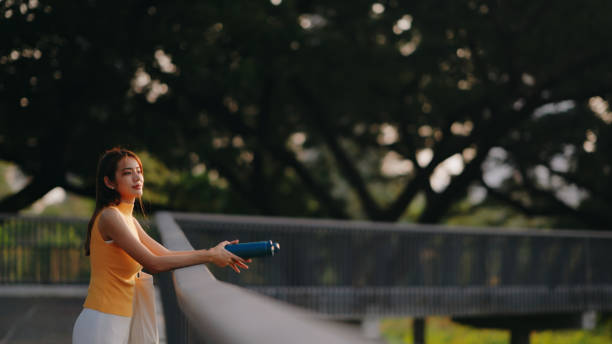 istock Reflective Pause in Urban Park 2152434274