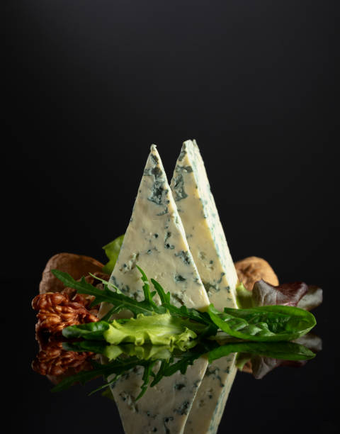 istock Blue cheese with walnuts and fresh greens. 2152438886