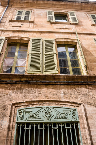istock A building with green shutters and windows 2152440563