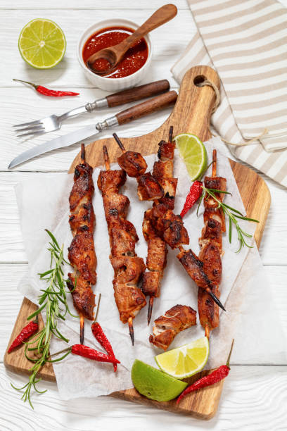 istock fried juicy pork kebabs on wooden cutting board 2152441891