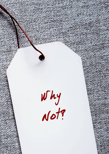 istock Paper tag with red handwritten text  WHY NOT? - to express agreement with suggestion,  state that one has no objection to and approves of a proposal 2152445585