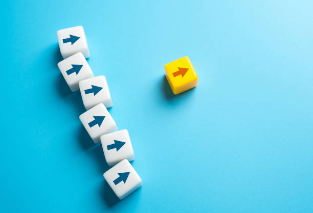 istock Follow the leader. Lead the way. Guiding principle. Effective communication, coordination. Work towards a collective vision. Promote ideology. Move forward. 2152446913