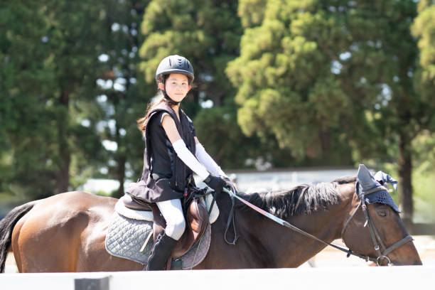 istock Girl enjoying horseback riding 2152449311