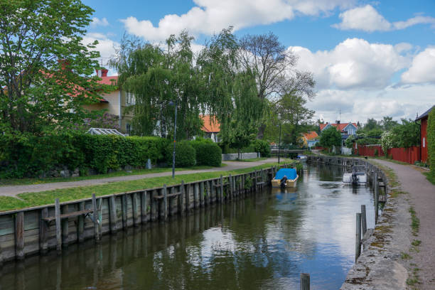 istock View of a canal through a small town 2152450738
