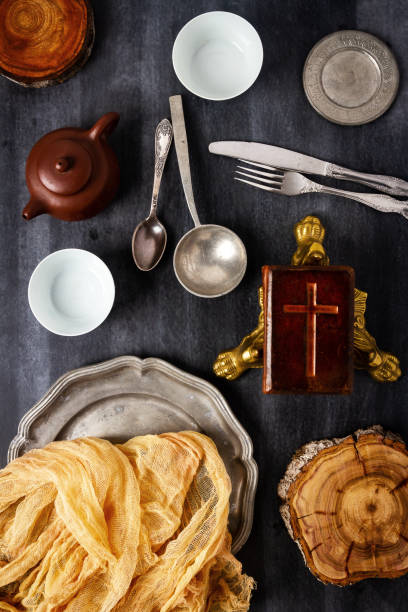 istock Various antique vintage dishes on black background 2152452354