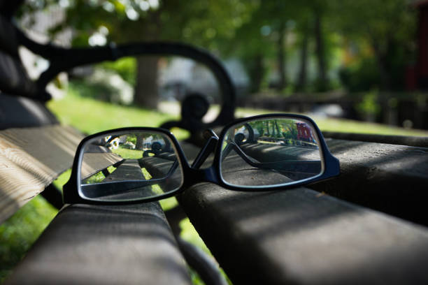 Close up of glasses on a bench