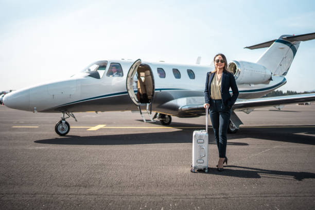 istock Executive Elegance Asian Businesswoman Descending from Jet 2152453240