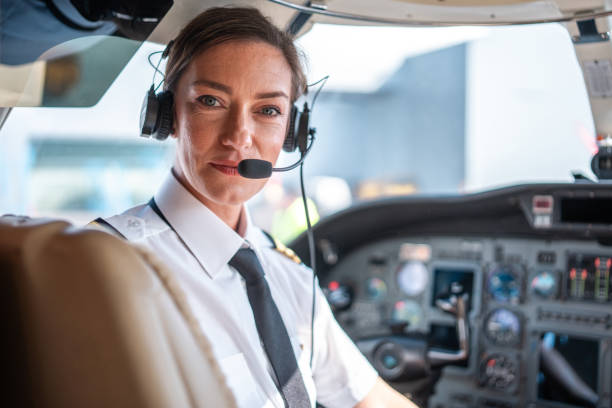 istock Confident Female Pilot in Aircraft Cockpit 2152453258