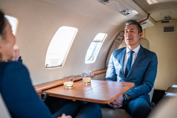 istock Senior Asian Business Leaders in Private Aircraft Setting 2152453262