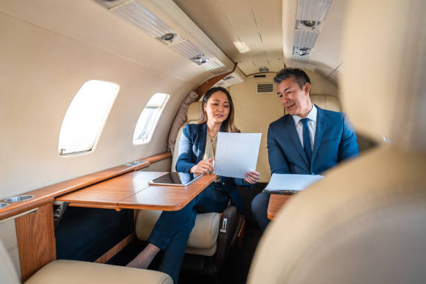 istock Asian Executives Working in Luxury Aircraft 2152453266