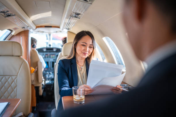 istock Mature Asian Executives in Private Jet Setting 2152453287