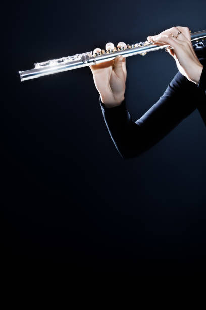 istock Flute music instrument hands 2152454282