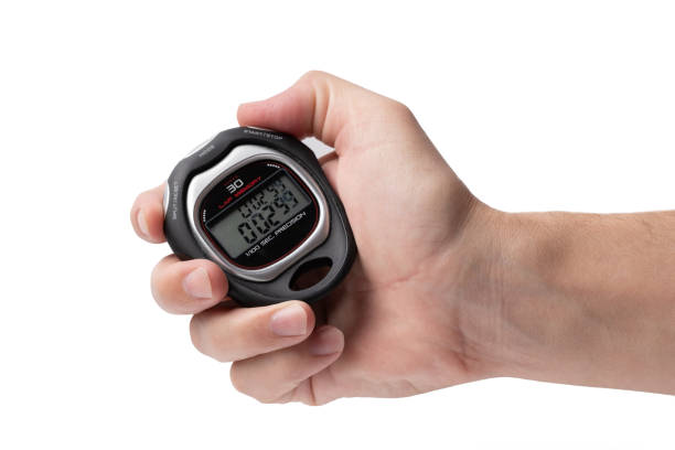 istock Hand holding a stopwatch isolated on white background. 2152456088