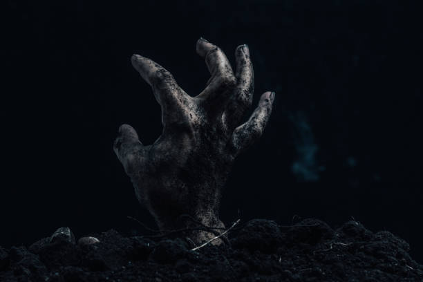 istock Zombie hand on dark background. Halloween concept. Horror theme. 2152456116