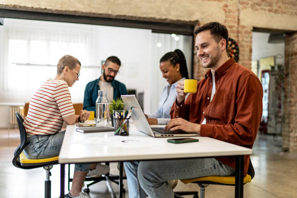 istock Young businessman working on laptop at the modern office 2152456146