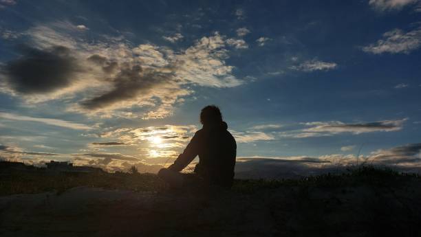 istock Silhouette of a man on a dune 2152465742