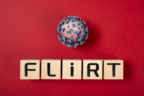 istock coronavirus and FLiRT variant on a red background 2152467464