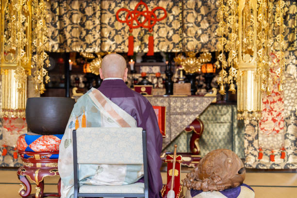 istock Monk praying at the temple 2152469994