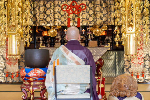 istock Monk praying at the temple 2152470012