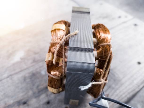 istock Electric motor winding coil , three phase induction motor winding coil assembly, procedure for replacing.With shiny light. 2152471613